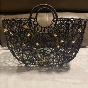 Black Woven basket with lighted star Accents